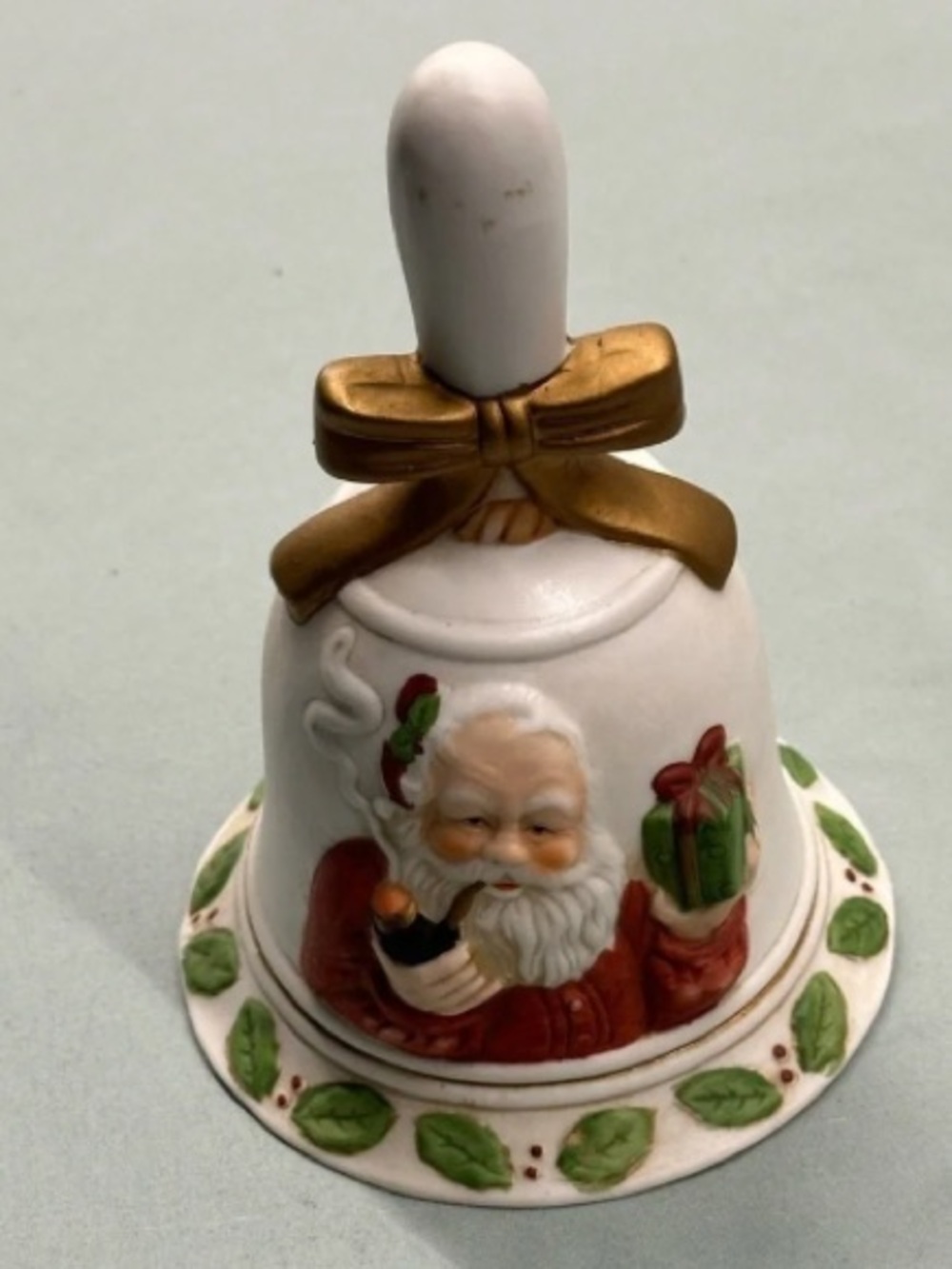 White Porcelain Santa Bell with Gold Bow and Green Holly Accents